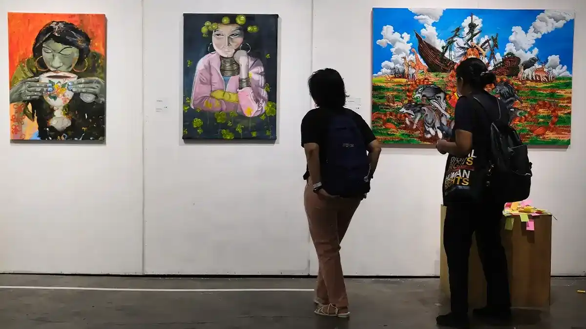 Portuguese Culture Minister Margarida Balseiro Lopes standing in an art gallery