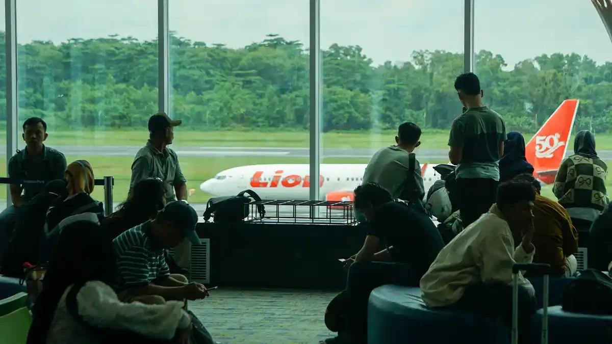 Tiket pesawat dengan label diskon PPN