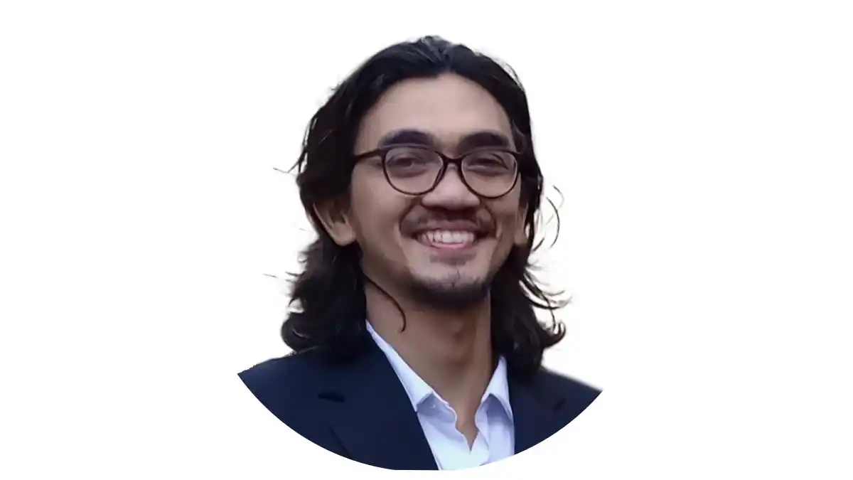 Protest crowd holding signs demanding tax reform in Indonesia