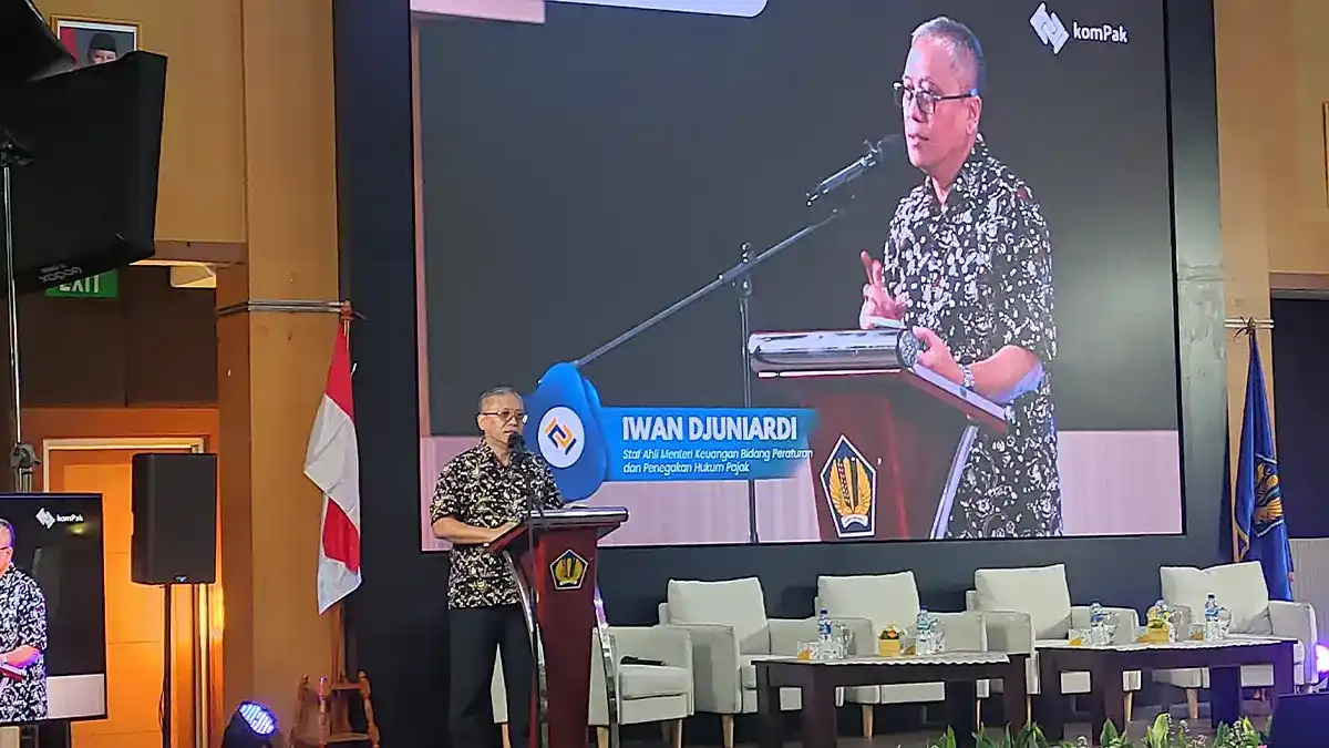 Finance Ministry official discussing digital tax challenges